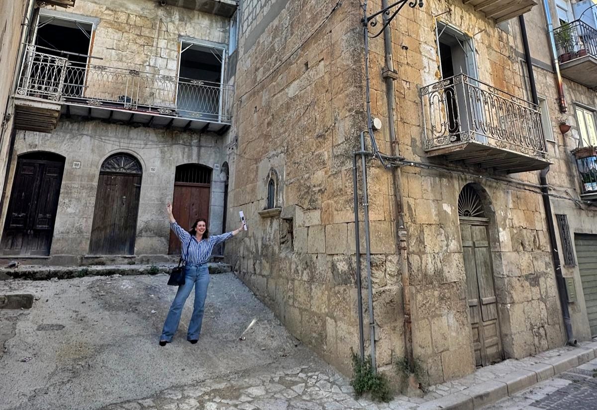 Woman buys 600-year-old Italian home for £22k after escaping sky-high LA rents - renovates 17-room medieval house in Sicily to build a peaceful, soulful life abroad.