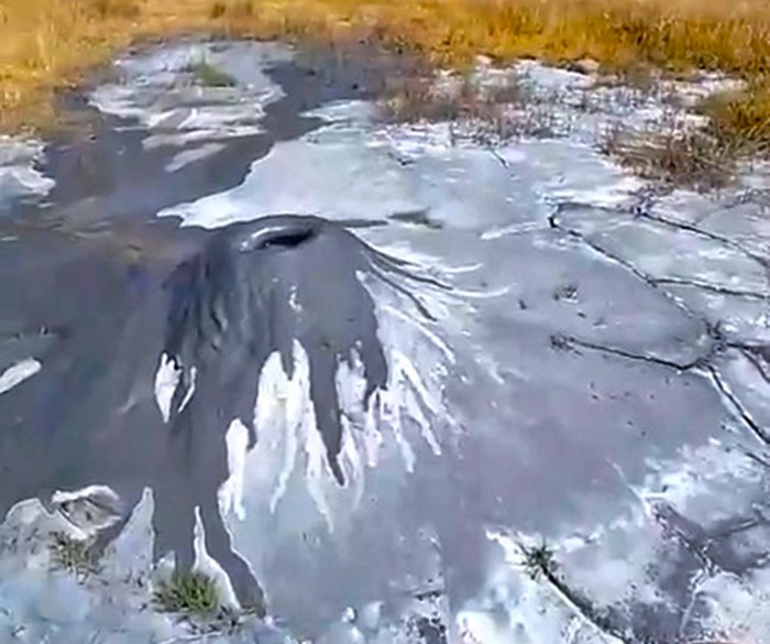 A 60cm mud volcano dubbed the world’s smallest has emerged in a Peruvian village, sparking intrigue and environmental concern as experts investigate its unusual activity.