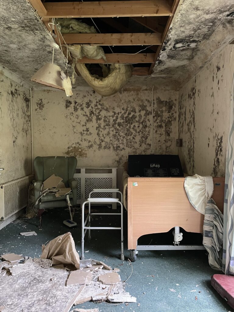 Urban explorer finds eerie abandoned care home in East Sussex with mouldy photos, baby dolls and rotting furniture left behind after closing its doors in 2020.