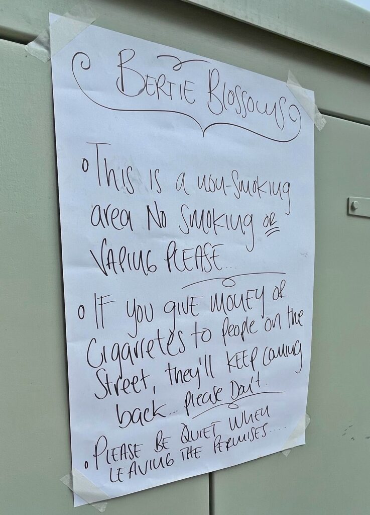 Staff at Ed Sheeran's Bertie Blossoms bar in Notting Hill urge customers not to give money or cigarettes to homeless people outside, following complaints from patrons.
