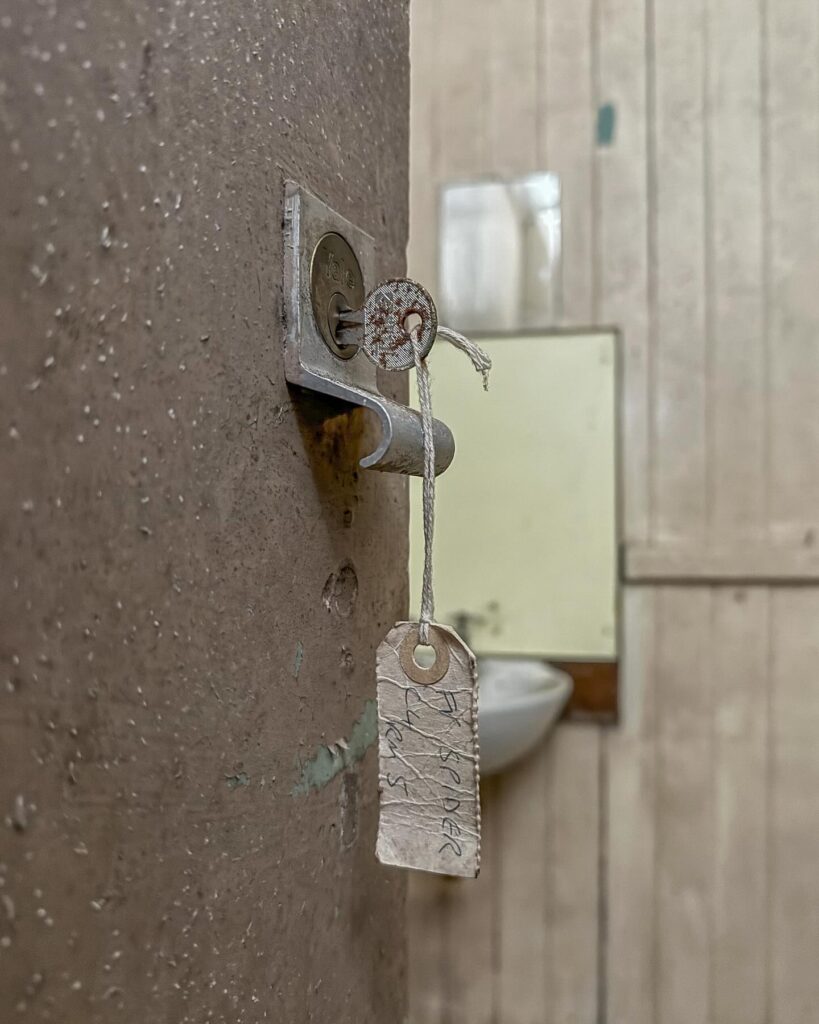 British explorer Chloe Urbex uncovers “super creepy” abandoned MOD barracks in London left to rot for 50 years - eerie photos reveal peeling walls, decayed halls and old signs.
