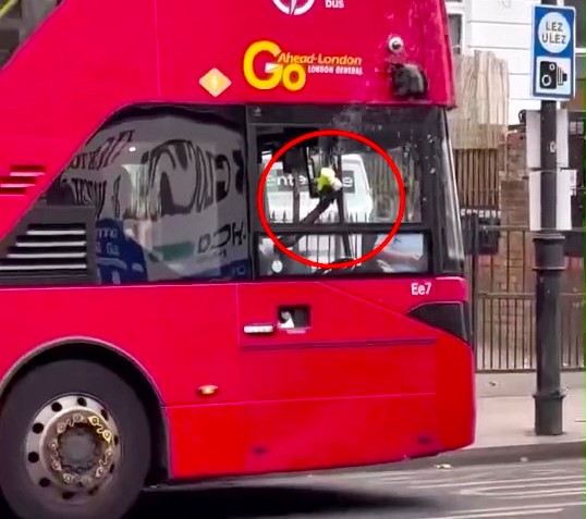 A London bus driver delighted commuters by using a bubble gun to fill the street with bubbles in Stoke Newington spreading joy during his route and brightening mornings.