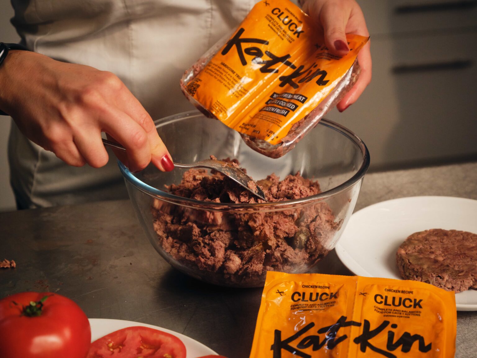 Michelin star chef creates cat food burger with KatKin to show pets deserve quality meals too - served in ciabatta with gourmet toppings and praised as delicious.