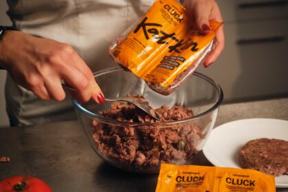 Michelin star chef creates cat food burger with KatKin to show pets deserve quality meals too - served in ciabatta with gourmet toppings and praised as delicious.