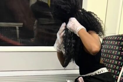 Woman shocks commuters by dyeing her hair on London Underground as baffled passenger films viral TikTok with 3.3m views showing brazen beauty routine on the Tube.
