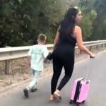 Dean and Gina Louca abandoned their taxi in a three mile M1 tailback and walked the hard shoulder to Luton Airport before a kind driver helped them catch their Greece flight.
