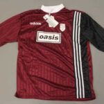 Rare Oasis football shirts to fetch thousands at auction - Noel and Liam Gallagher’s 1995 pub team kits made by Adidas expected to sell for up to £3,000 in Ilkley sale.