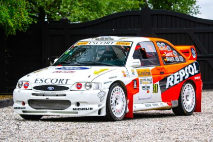 A 1997 Ford Escort WRC driven by Carlos Sainz Sr. to multiple rally wins is set for auction, expected to fetch over £350,000, making it a rare collector’s piece.