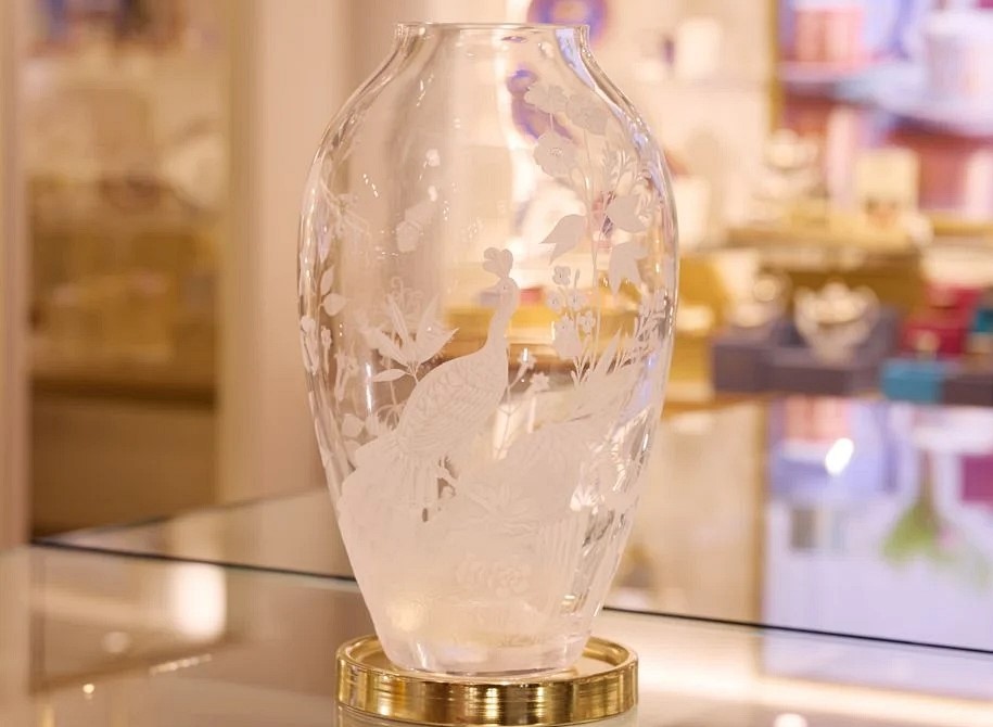 King Charles has launched a £4,000 limited edition crystal vase as a luxury wedding gift, inspired by Buckingham Palace wallpaper with only 10 pieces available worldwide.