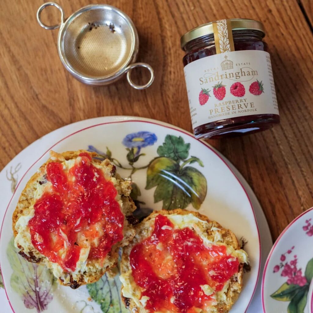 King Charles sells Sandringham raspberry jam for £4.99, less than half Meghan Markle’s price, offering a locally made, additive free preserve with rich fruity flavor.