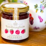 King Charles sells Sandringham raspberry jam for £4.99, less than half Meghan Markle’s price, offering a locally made, additive free preserve with rich fruity flavor.