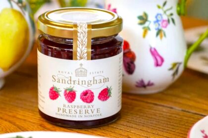 King Charles sells Sandringham raspberry jam for £4.99, less than half Meghan Markle’s price, offering a locally made, additive free preserve with rich fruity flavor.