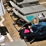 British tourists spark chaos in Tenerife as some sleep overnight on sunbeds to secure prime pool spots at a £259 a night hotel fueling this year’s escalating sunbed wars.