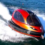 The Jet Capsule by Lazzarini Design Studios is a futuristic luxury pod boat starting at £271k, offering custom interiors, zero-emissions cruising and sleek space-age design.