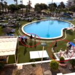 A dad on his first all inclusive holiday went viral after filming the chaotic daily sun bed wars at a Spanish hotel, comparing the stampede to a David Attenborough scene.