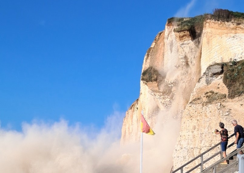 Huge chalk cliff collapses in Normandy sending tonnes of rock crashing onto beach - dramatic landslide near Petites Dalles shocks locals but miraculously no injuries.