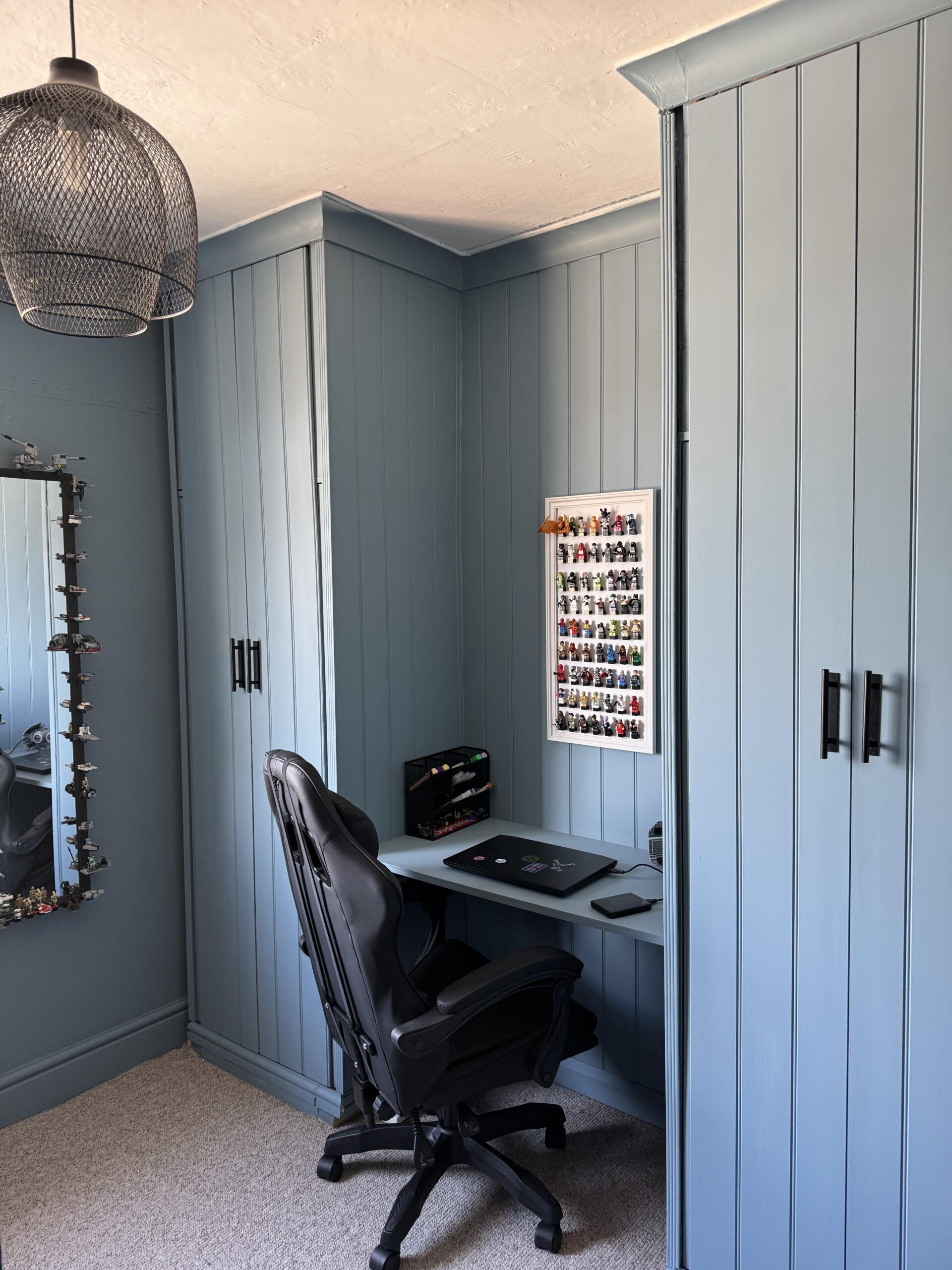 A mum has created bespoke built-in wardrobes for her son using flatpack Argos furniture, saving over £2,300. The project involved basic tools, MDF panels, and a creative design, totaling just £912.33.