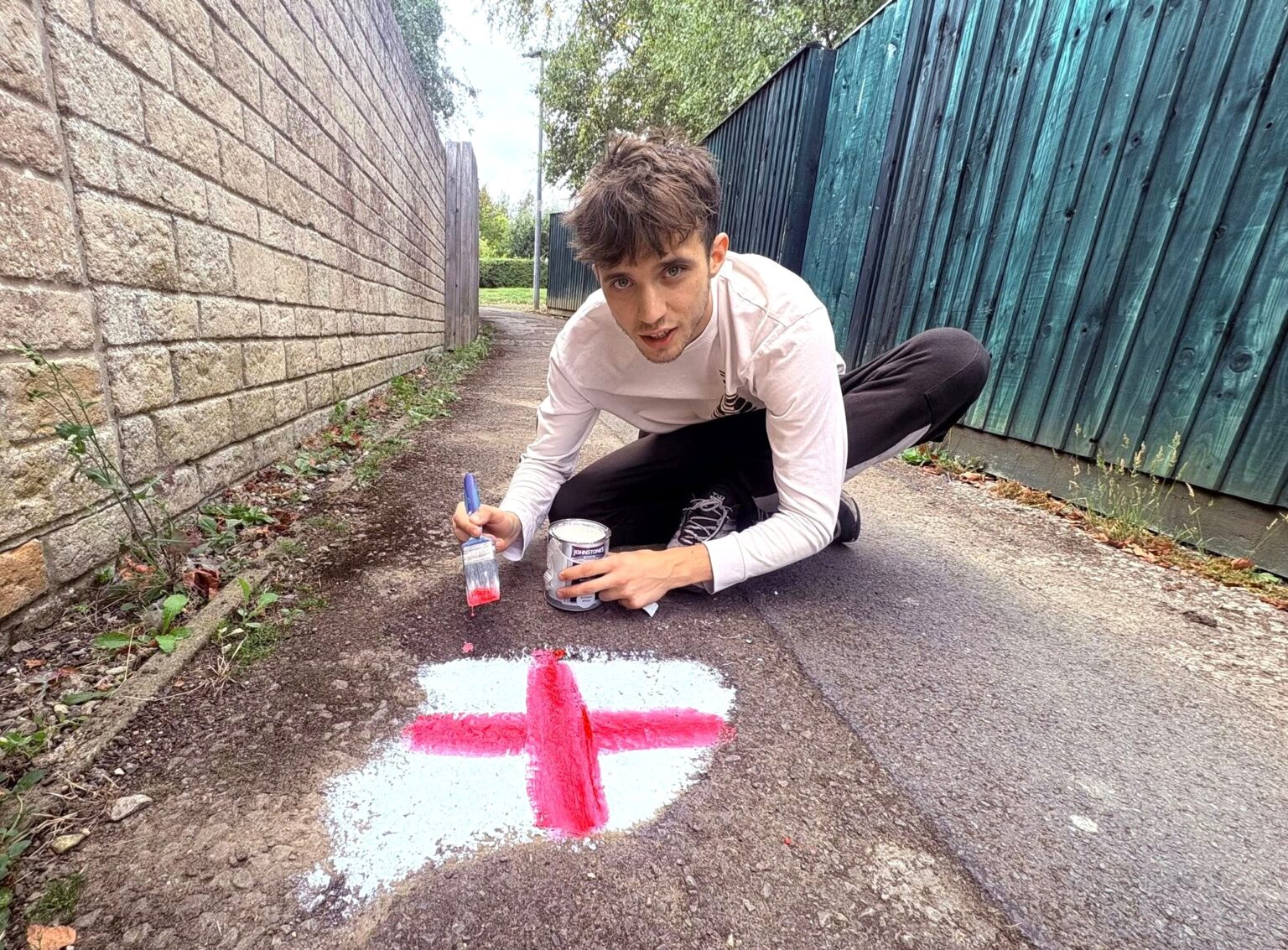 Patriotic potholes in Malmesbury get a makeover as a resident paints St George’s Crosses on them to highlight road issues and push for repairs with local support.