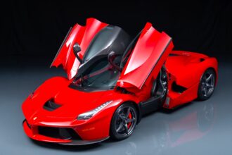 A 2015 Ferrari LaFerrari in Rosso Corsa with just 54 miles and over £127k in options is for sale in Monterey for £3.5m offered in pristine time capsule condition.