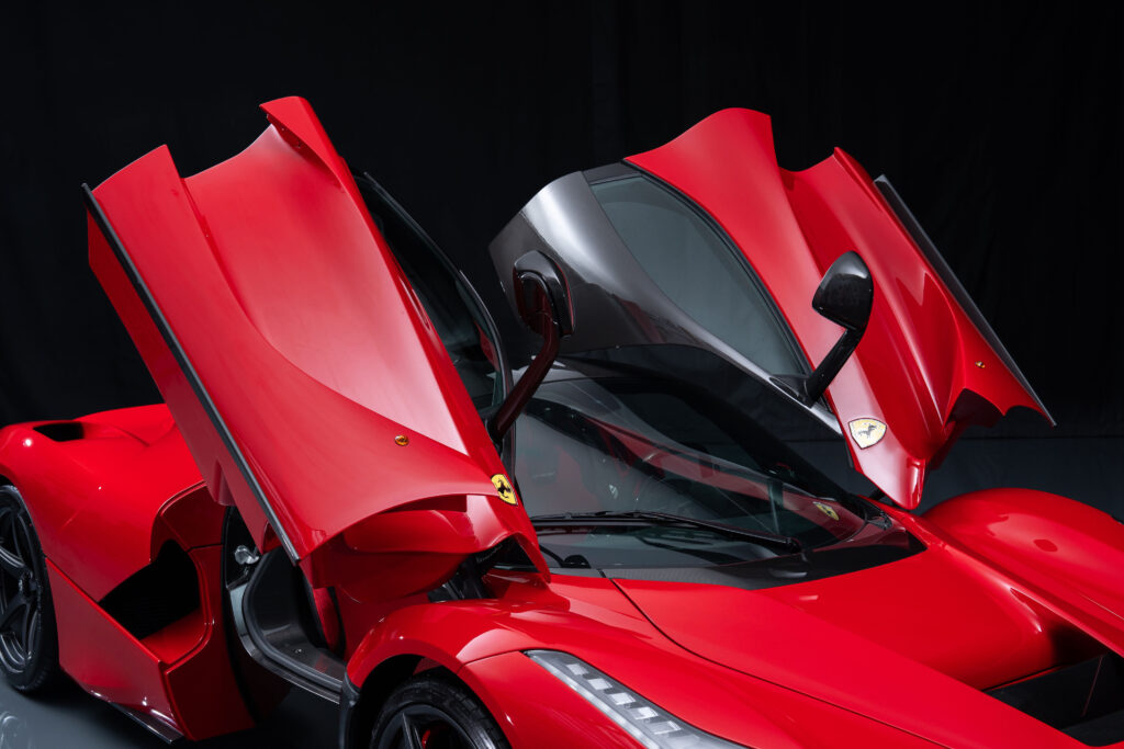 A 2015 Ferrari LaFerrari in Rosso Corsa with just 54 miles and over £127k in options is for sale in Monterey for £3.5m offered in pristine time capsule condition.