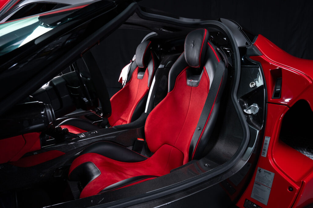 A 2015 Ferrari LaFerrari in Rosso Corsa with just 54 miles and over £127k in options is for sale in Monterey for £3.5m offered in pristine time capsule condition.