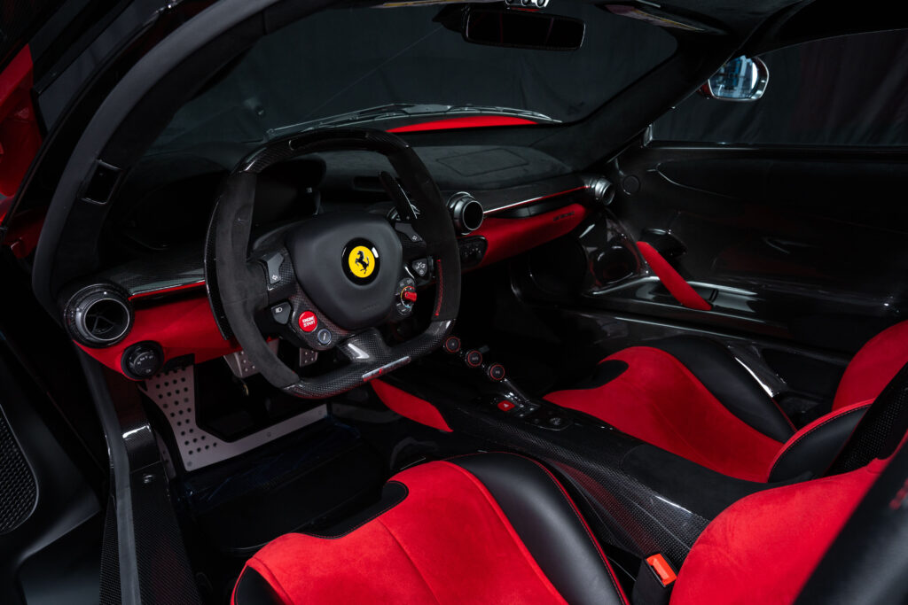 A 2015 Ferrari LaFerrari in Rosso Corsa with just 54 miles and over £127k in options is for sale in Monterey for £3.5m offered in pristine time capsule condition.