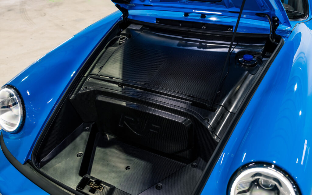 A rare 2021 RUF CTR Anniversary based on the Porsche 911 with 710bhp 224mph top speed and unique Riviera Blue spec is for sale in Monterey for £2.5m with only 200 miles.