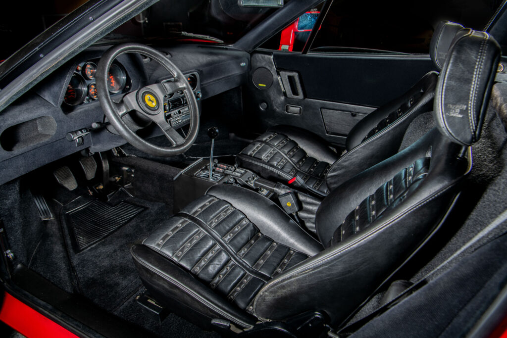 A 1985 Ferrari 288 GTO with just 947 miles is hitting the auction block. One of only seven under 1,000 miles, it’s a rare gem with a 189mph top speed and rich history.