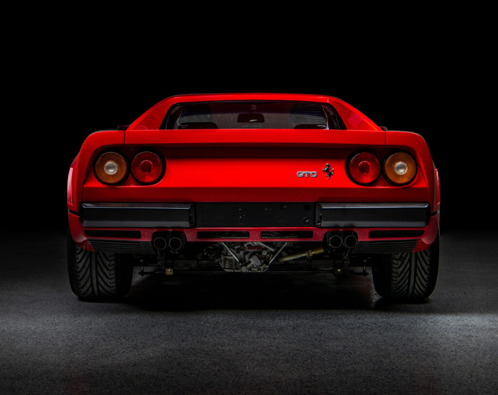 A 1985 Ferrari 288 GTO with just 947 miles is hitting the auction block. One of only seven under 1,000 miles, it’s a rare gem with a 189mph top speed and rich history.