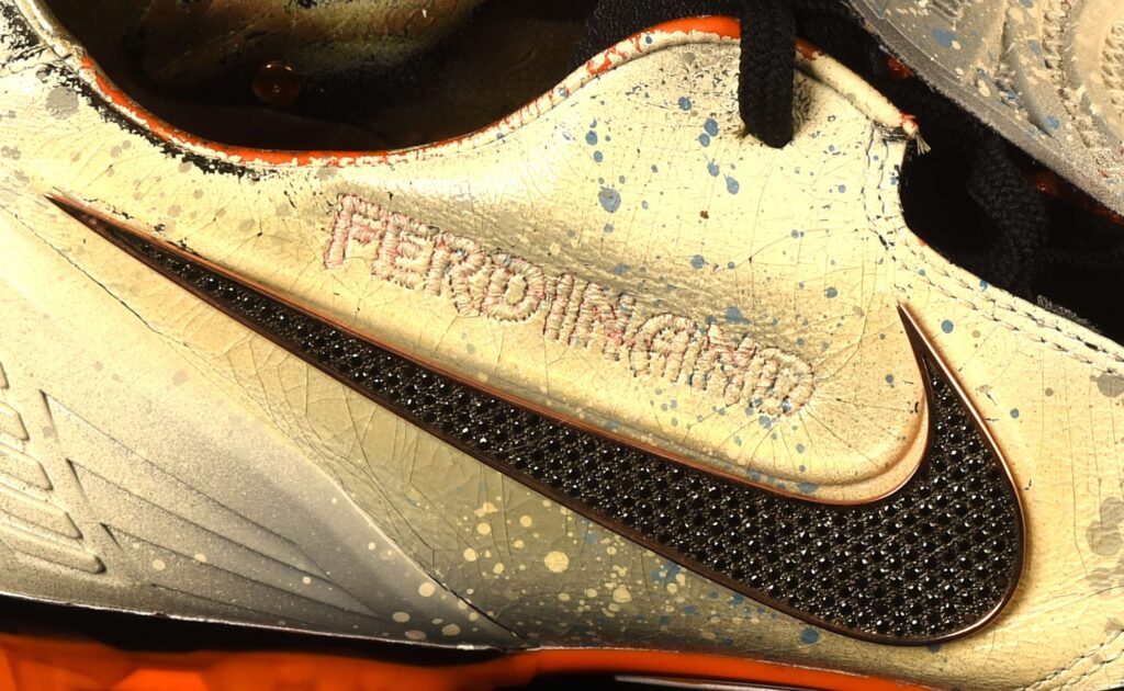 Rio Ferdinand’s diamond encrusted, gold coated Nike boots have sold for £23,400 at auction. Signed and custom designed, they’re among the world’s most unique boots.