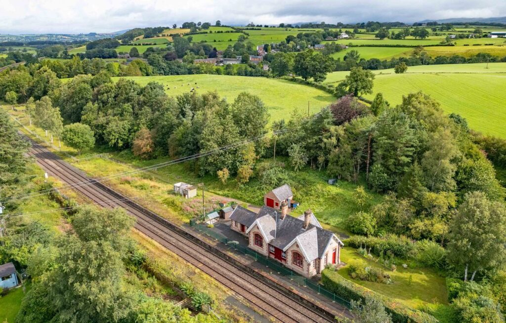 Victorian railway station home in Little Salkeld on market for £375,000 with original features, three bedrooms, gardens and paddock offering unique historic charm.