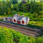Victorian railway station home in Little Salkeld on market for £375,000 with original features, three bedrooms, gardens and paddock offering unique historic charm.