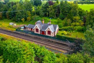 Victorian railway station home in Little Salkeld on market for £375,000 with original features, three bedrooms, gardens and paddock offering unique historic charm.