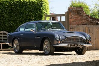 Ultra rare 1966 Aston Martin DB6 Mk1 Vantage sells for £216,000 at auction - classic slate grey grand tourer with manual ZF gearbox had fewer than 5,000 miles since 1991.