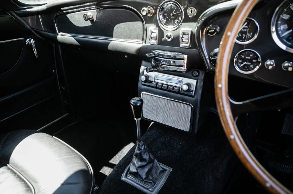 Ultra rare 1966 Aston Martin DB6 Mk1 Vantage sells for £216,000 at auction - classic slate grey grand tourer with manual ZF gearbox had fewer than 5,000 miles since 1991.