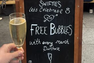 Taylor Swift fans can toast her engagement with free bubbly at The Black Dog pub in Vauxhall London - the bar named on her album is offering drinks for Swifties.