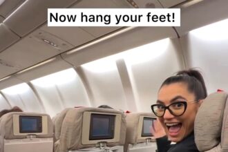 Travel expert Nicole Lazo shares 5 top comfort hacks for flying, from makeshift phone holders to foot hammocks, sparking debate with one controversial tip for better sleep.