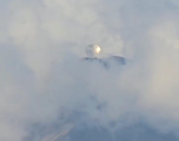 A motorist mistook a giant telescope for a UFO near Mexico's Sierra Negra volcano. The viral clip sparked alien theories before officials confirmed it was the Large Millimeter Telescope.