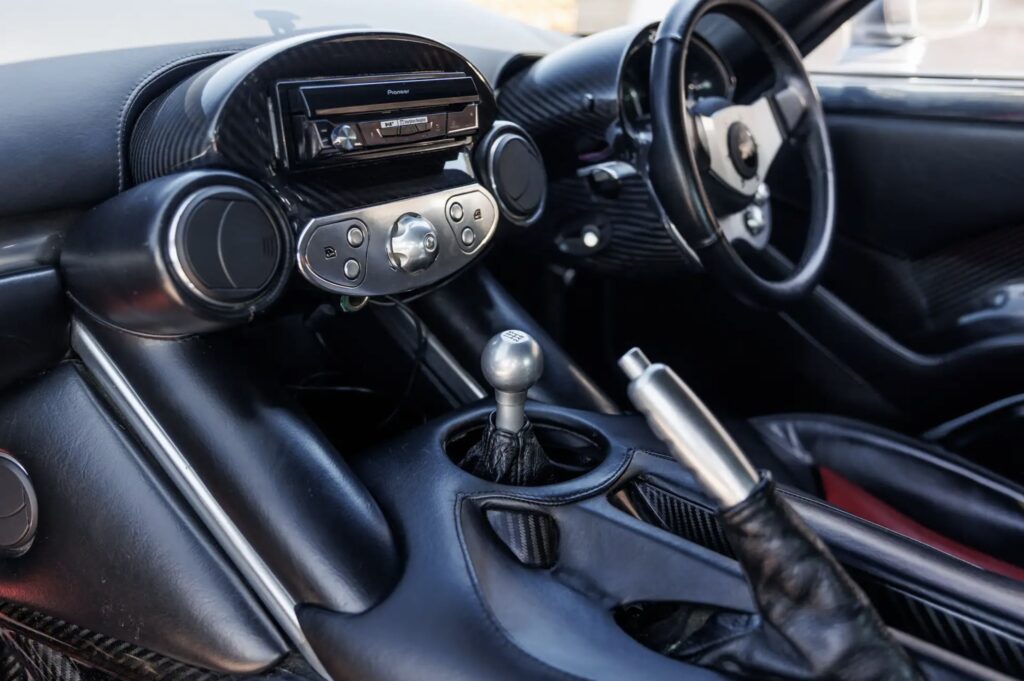 The only production TVR T440R, a 215mph Le Mans-inspired British supercar with a 4.2L 440bhp engine, is for sale at £190,000, offering unmatched rarity and performance.