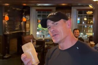 WWE legend John Cena stunned Dublin fans by pulling pints and downing a Guinness in one go during his farewell tour stop, delighting locals at J.R. Mahon’s pub.