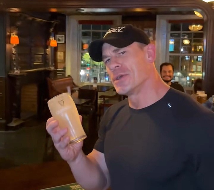 WWE legend John Cena stunned Dublin fans by pulling pints and downing a Guinness in one go during his farewell tour stop, delighting locals at J.R. Mahon’s pub.