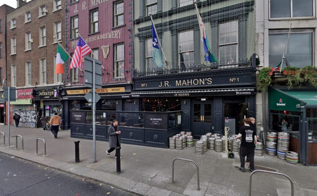 WWE legend John Cena stunned Dublin fans by pulling pints and downing a Guinness in one go during his farewell tour stop, delighting locals at J.R. Mahon’s pub.