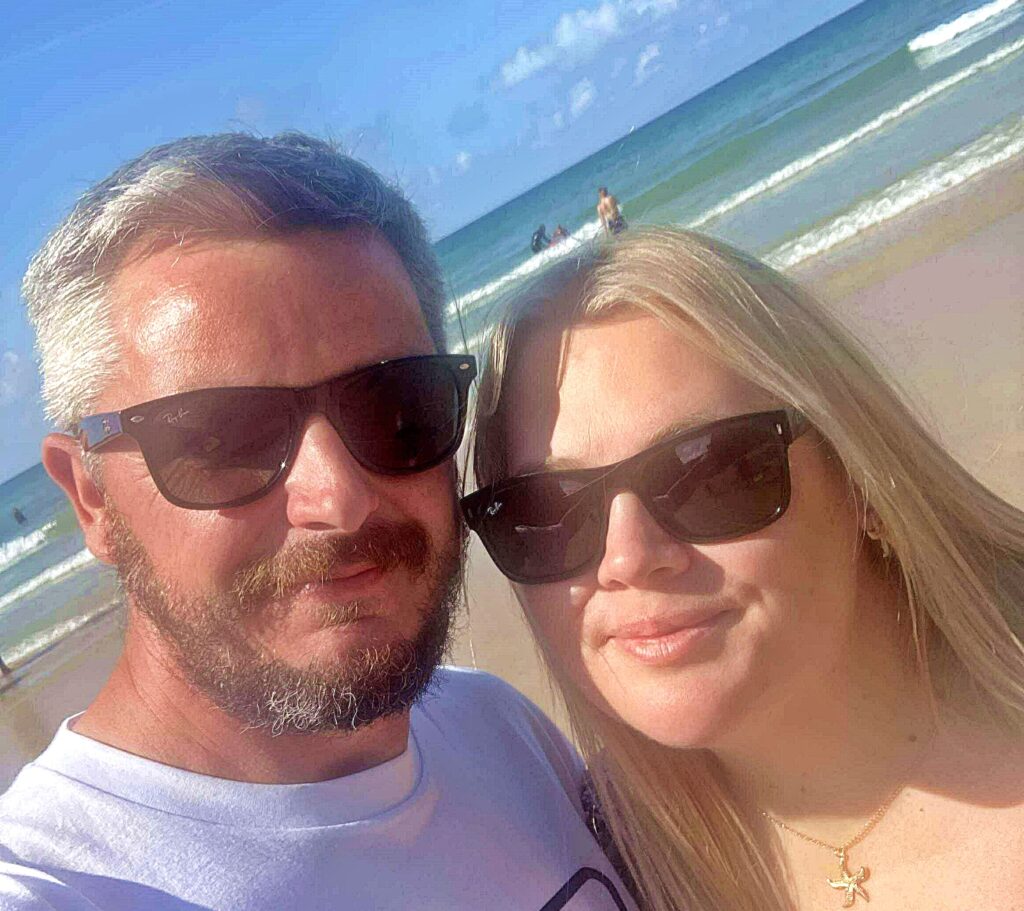 A tourist’s hilarious tanning fail left beachgoers in stitches after he revealed bright white feet against his bronzed legs in Newquay, Cornwall, with photos going viral online.