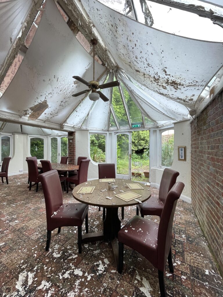 Urban explorer discovers abandoned Kent pub The Harrow left frozen in time since 2006 - mould covered rooms but booze and even a pint still remain on the counter.