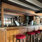 Urban explorer discovers abandoned Kent pub The Harrow left frozen in time since 2006 - mould covered rooms but booze and even a pint still remain on the counter.