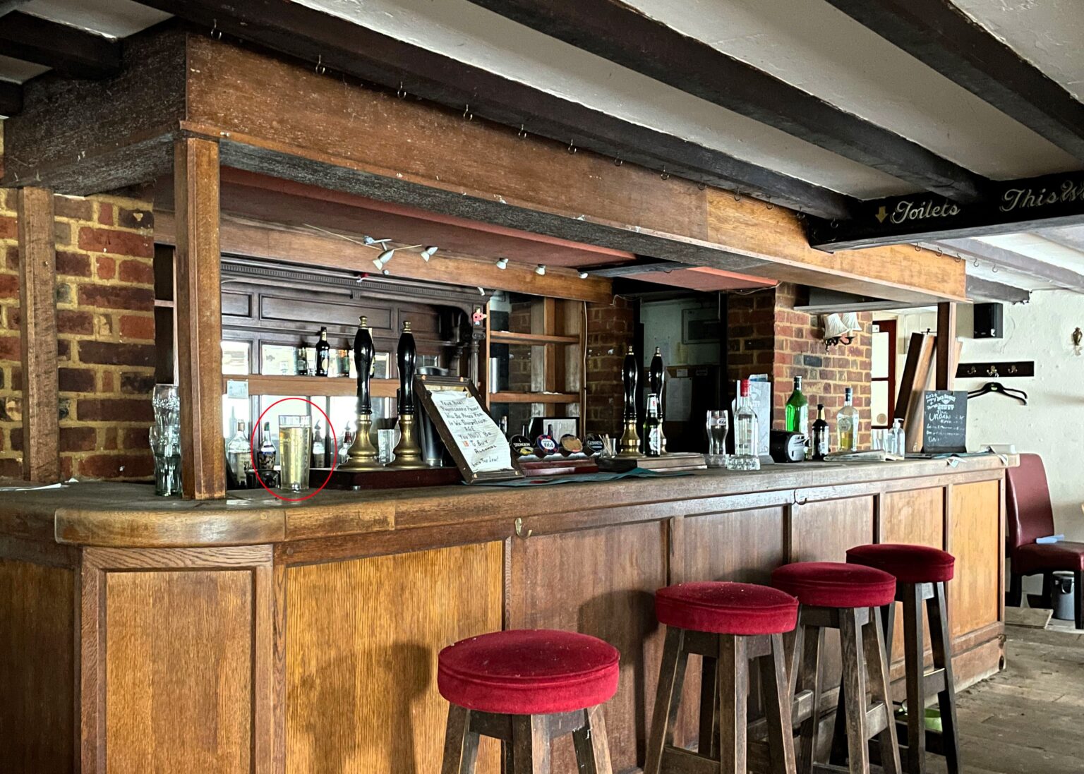 Urban explorer discovers abandoned Kent pub The Harrow left frozen in time since 2006 - mould covered rooms but booze and even a pint still remain on the counter.