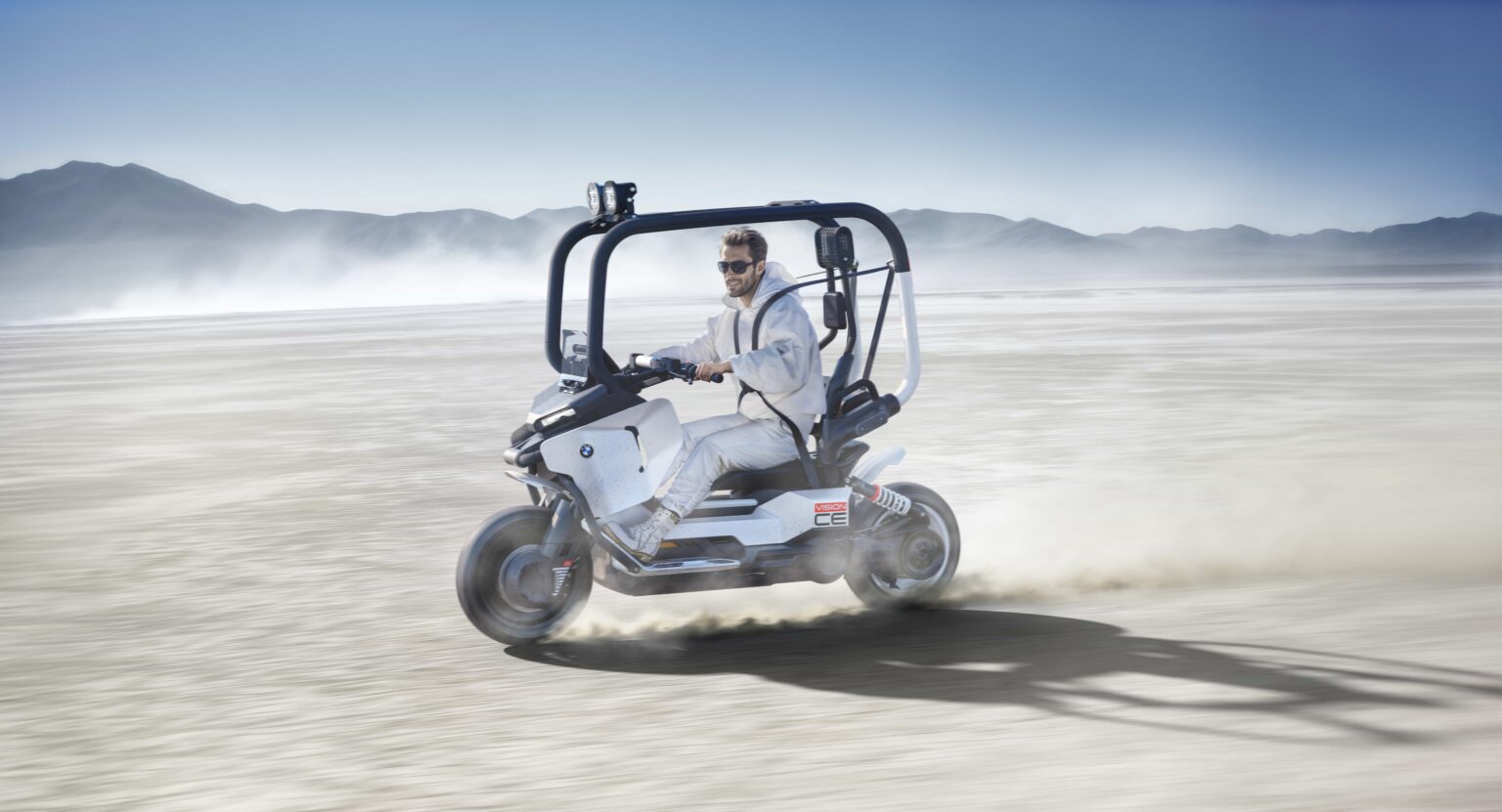 BMW unveils the Motorrad Vision CE, a futuristic electric scooter with roll cage, self-balancing tech and bold design, redefining safe and stylish urban mobility.