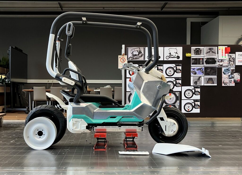BMW unveils the Motorrad Vision CE, a futuristic electric scooter with roll cage, self-balancing tech and bold design, redefining safe and stylish urban mobility.
