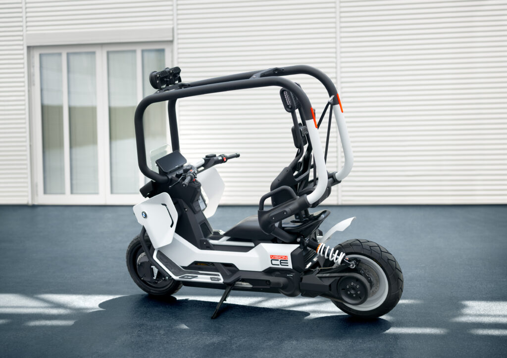 BMW unveils the Motorrad Vision CE, a futuristic electric scooter with roll cage, self-balancing tech and bold design, redefining safe and stylish urban mobility.