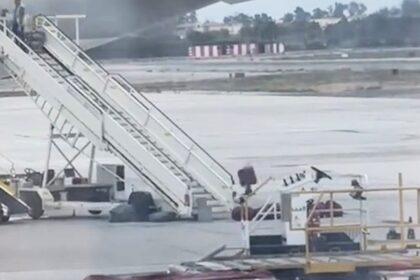 Baggage handler filmed hurling items like an Olympian at Madrid Airport sparks debate - some slam treatment of luggage while others defend it as efficient cabin work.